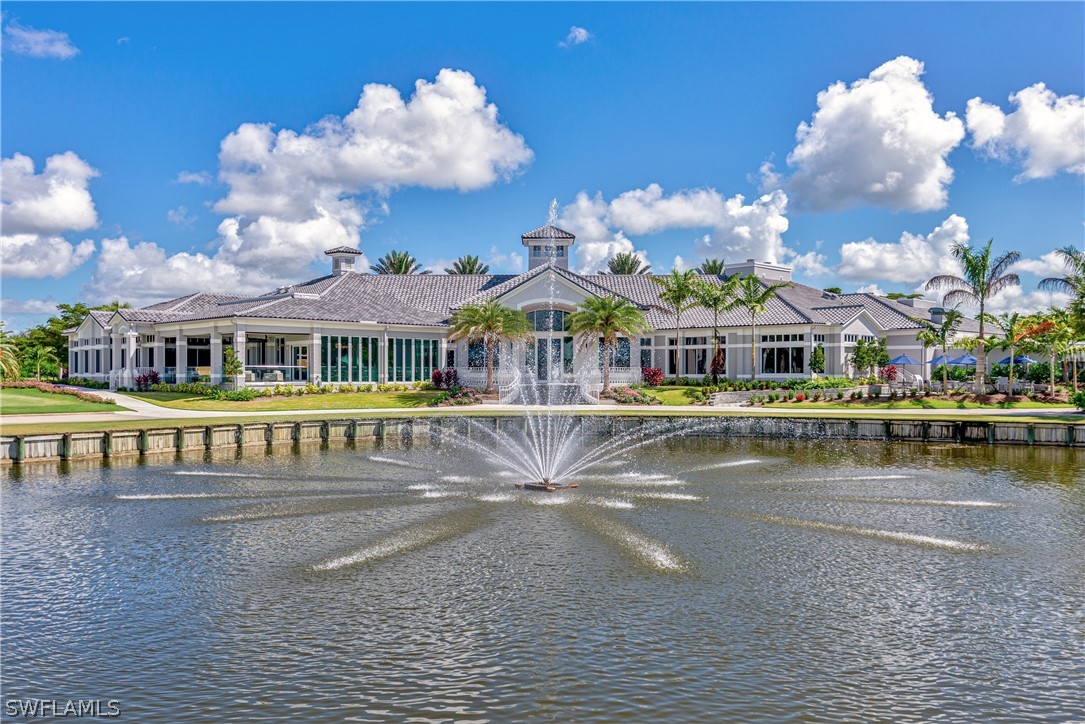 10013 Sky View Way, Unit 1705 Fort Myers, FL 33913 - Photo 17 of 24 a front view of house with yard swimming pool and outdoor seating