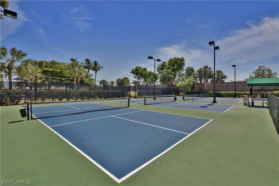 10013 Sky View Way, Unit 1705 Fort Myers, FL 33913 - Photo 22 of 24 a view of a tennis court