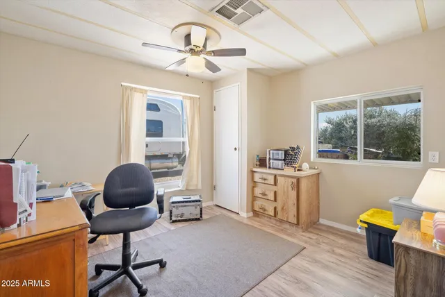 a room with furniture and a window