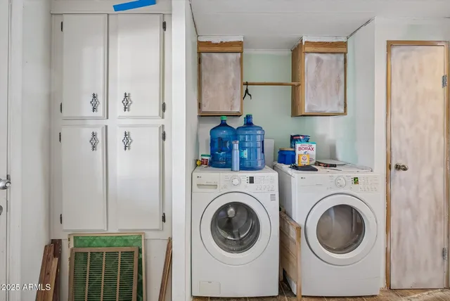 a utility room with dryer and washer