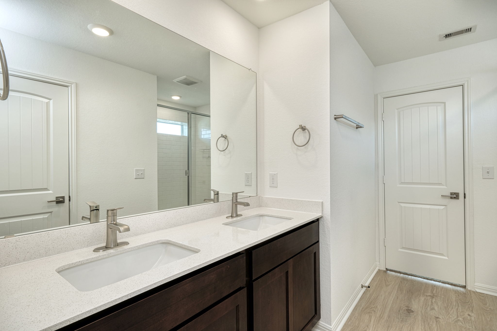 409 Brody Lane Georgetown, TX 78626 - Photo 7 of 14 a bathroom with double vanity sinks and a mirror