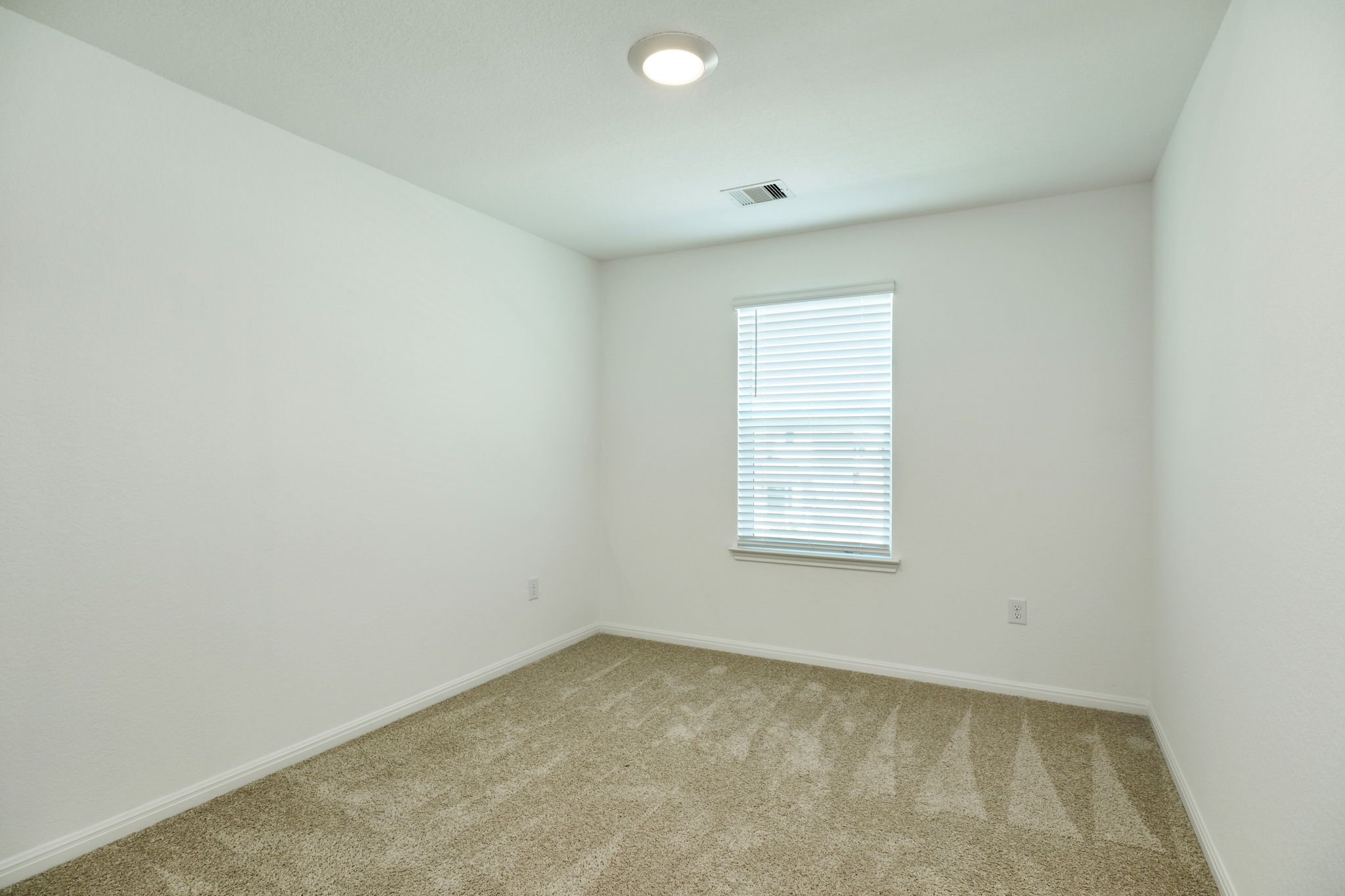 409 Brody Lane Georgetown, TX 78626 - Photo 8 of 14 an empty room with a window