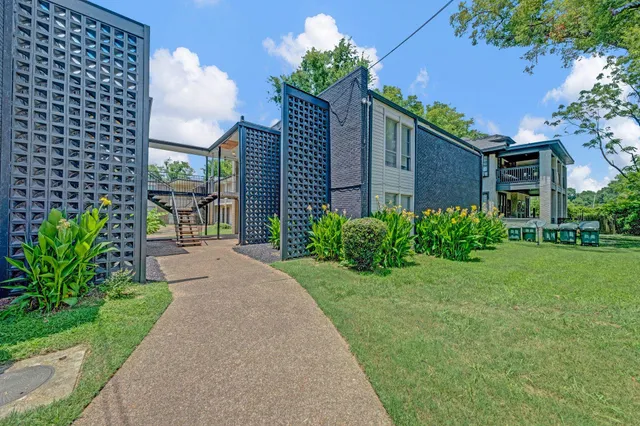a house view with a garden space