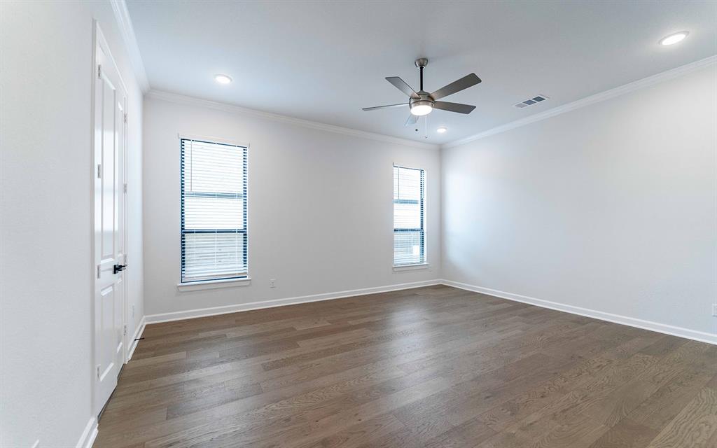 1916 Casting Ridge Mesquite, TX 75181 - Photo 15 of 26 wooden floor in an empty room with a window