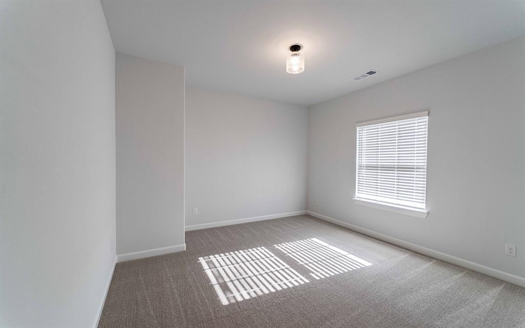 1916 Casting Ridge Mesquite, TX 75181 - Photo 17 of 26 a view of an empty room with a window