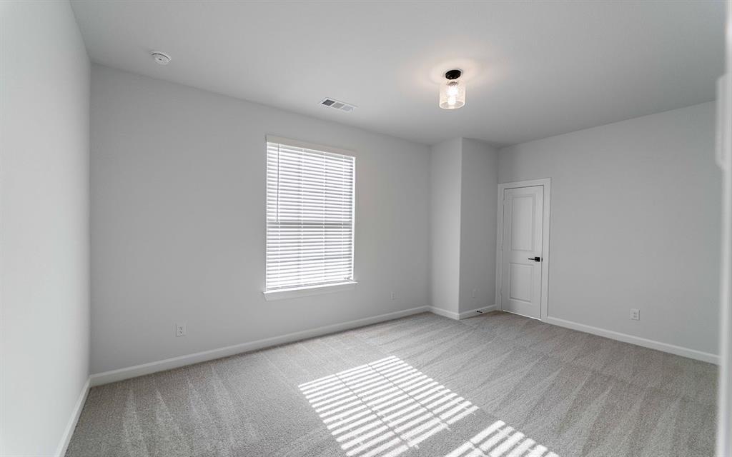 1916 Casting Ridge Mesquite, TX 75181 - Photo 19 of 26 a view of an empty room with a window