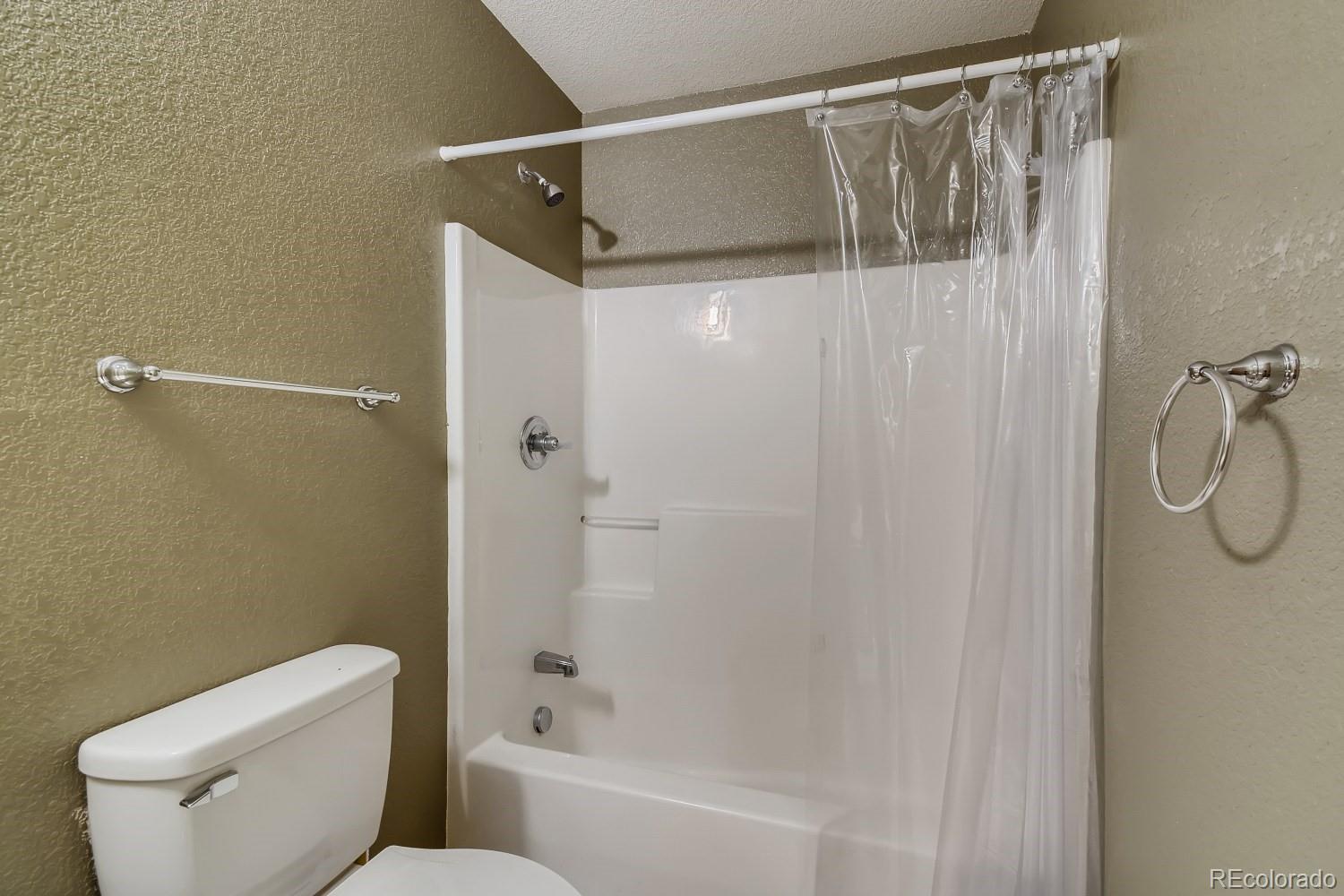 541 Paiute Road Evergreen, CO 80439 - Photo 15 of 22 a bathroom with a shower and toilet