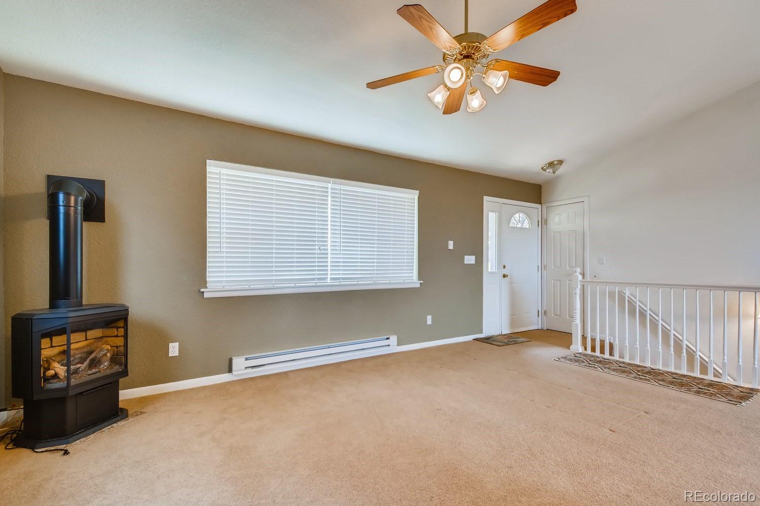 541 Paiute Road Evergreen, CO 80439 - Photo 5 of 22 a view of an empty room with a window