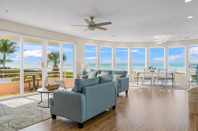a view of a city from a dining room with a large window