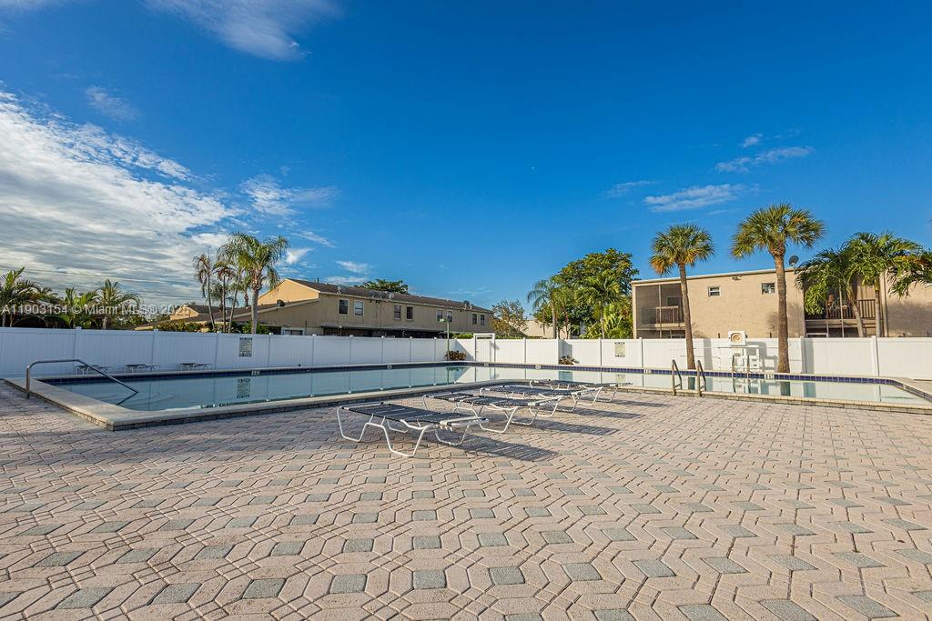 3450 Blue Lake Drive, Unit 305 Pompano Beach, FL 33064 - Photo 26 of 66 a view of a terrace