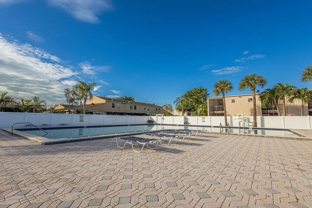 3450 Blue Lake Drive, Unit 305 Pompano Beach, FL 33064 - Photo 27 of 66 a view of a terrace