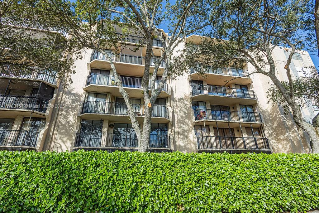 3450 Blue Lake Drive, Unit 305 Pompano Beach, FL 33064 - Photo 33 of 66 front view of a building