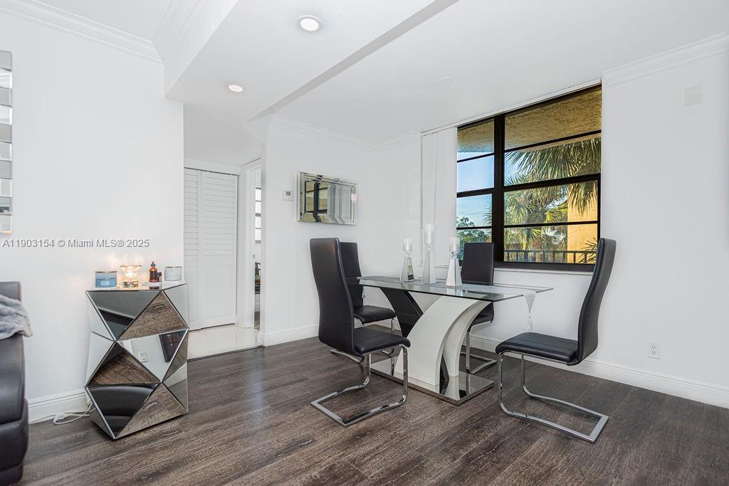 3450 Blue Lake Drive, Unit 305 Pompano Beach, FL 33064 - Photo 9 of 66 a view of a workspace with furniture and a window