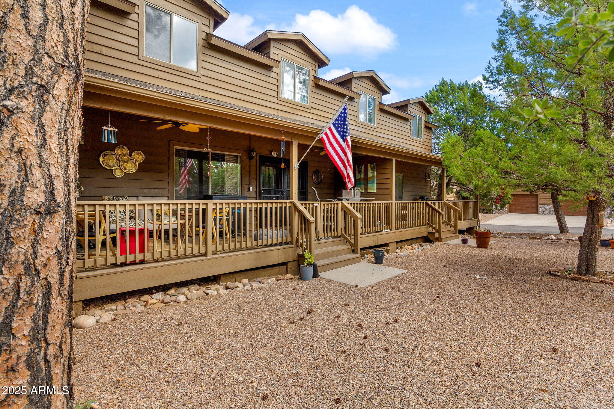 6935 Starlight Ridge Road Lakeside, AZ 85929 - Photo 3 of 33 a view of a house with wooden deck
