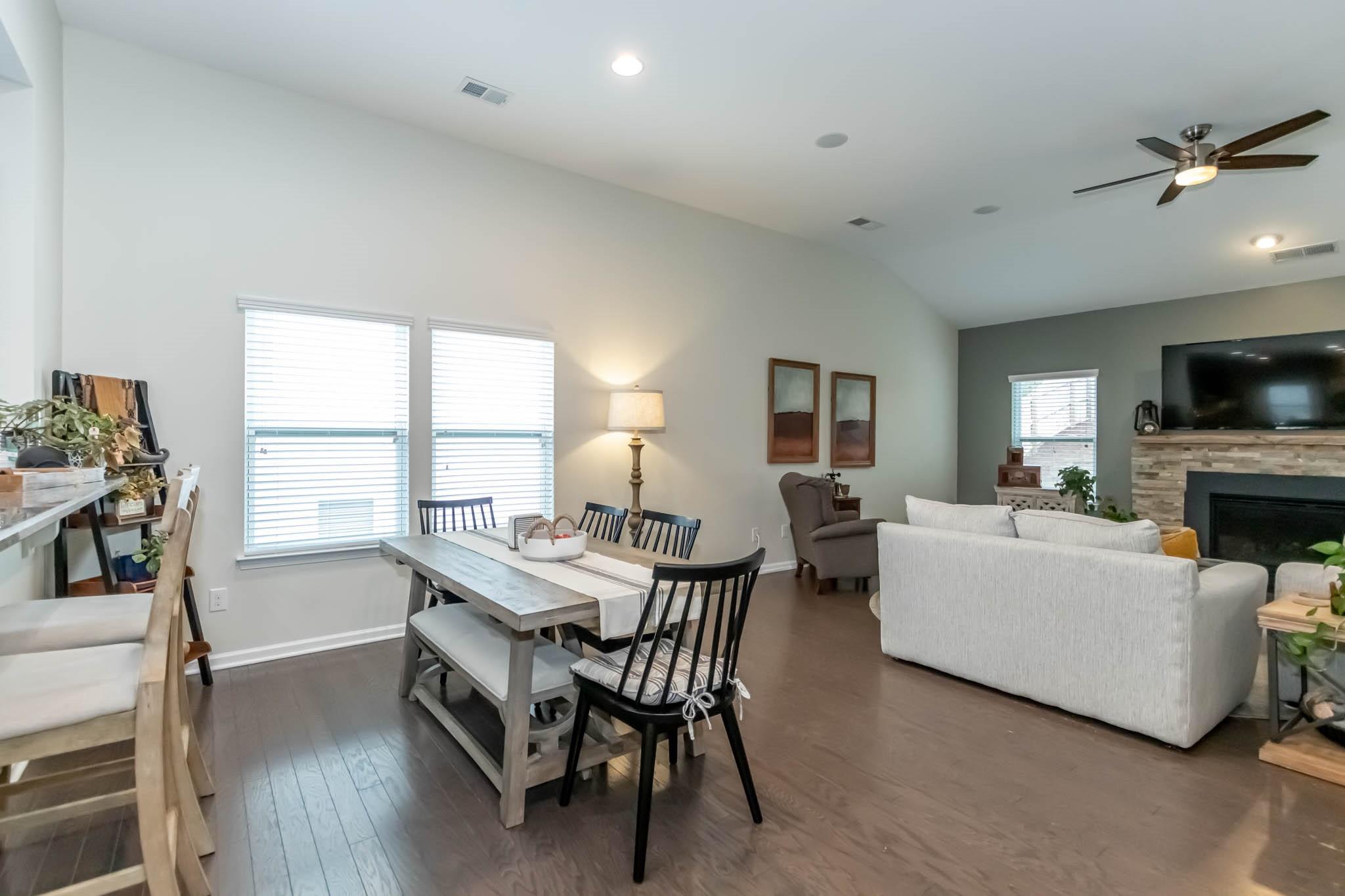 2984 Hiddenbrook Way Indian Land, SC 29707 - Photo 12 of 32 a view of a dining room with furniture window and wooden floor