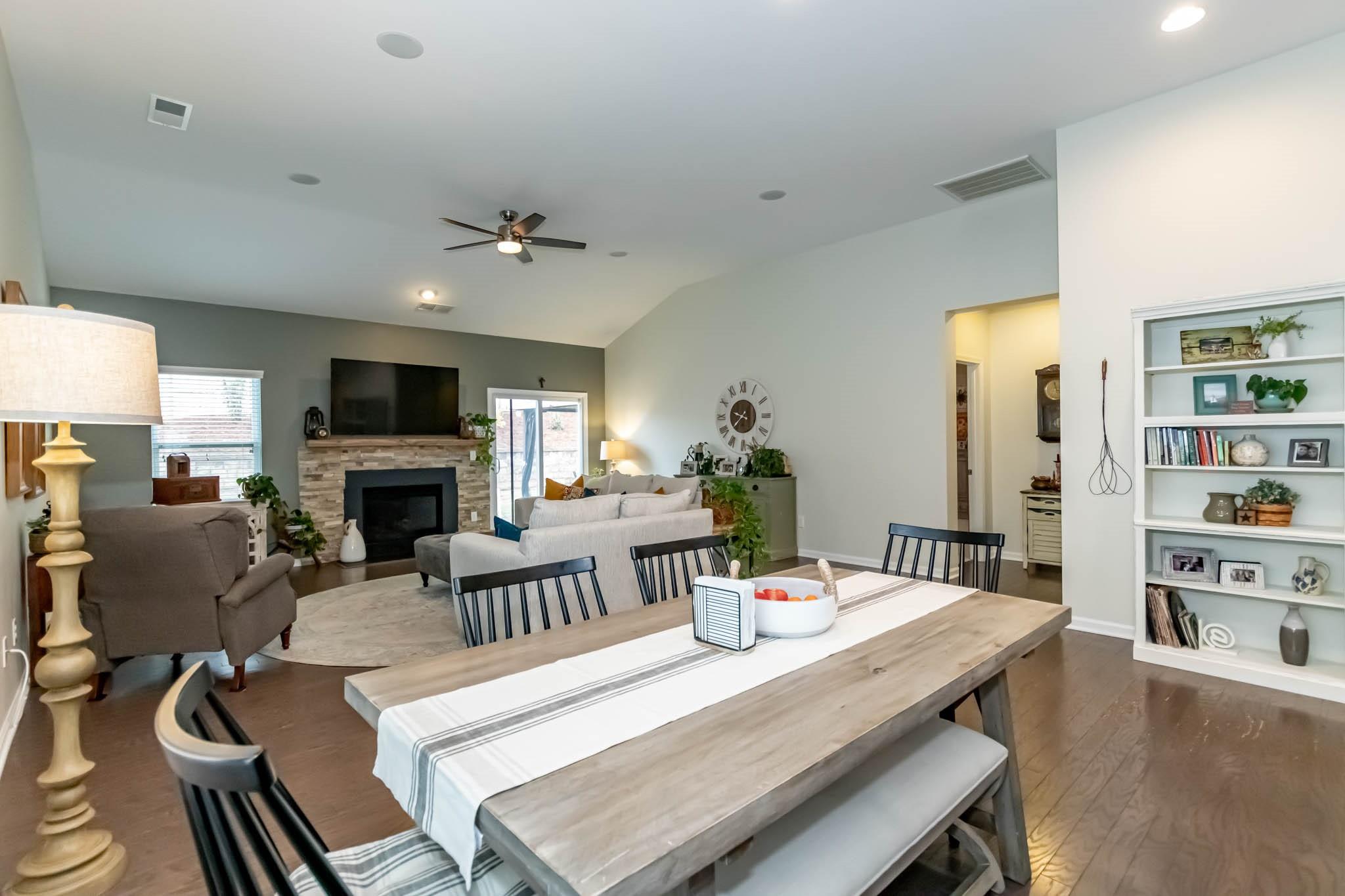 2984 Hiddenbrook Way Indian Land, SC 29707 - Photo 13 of 32 a view of a dining room with furniture a rug and wooden floor