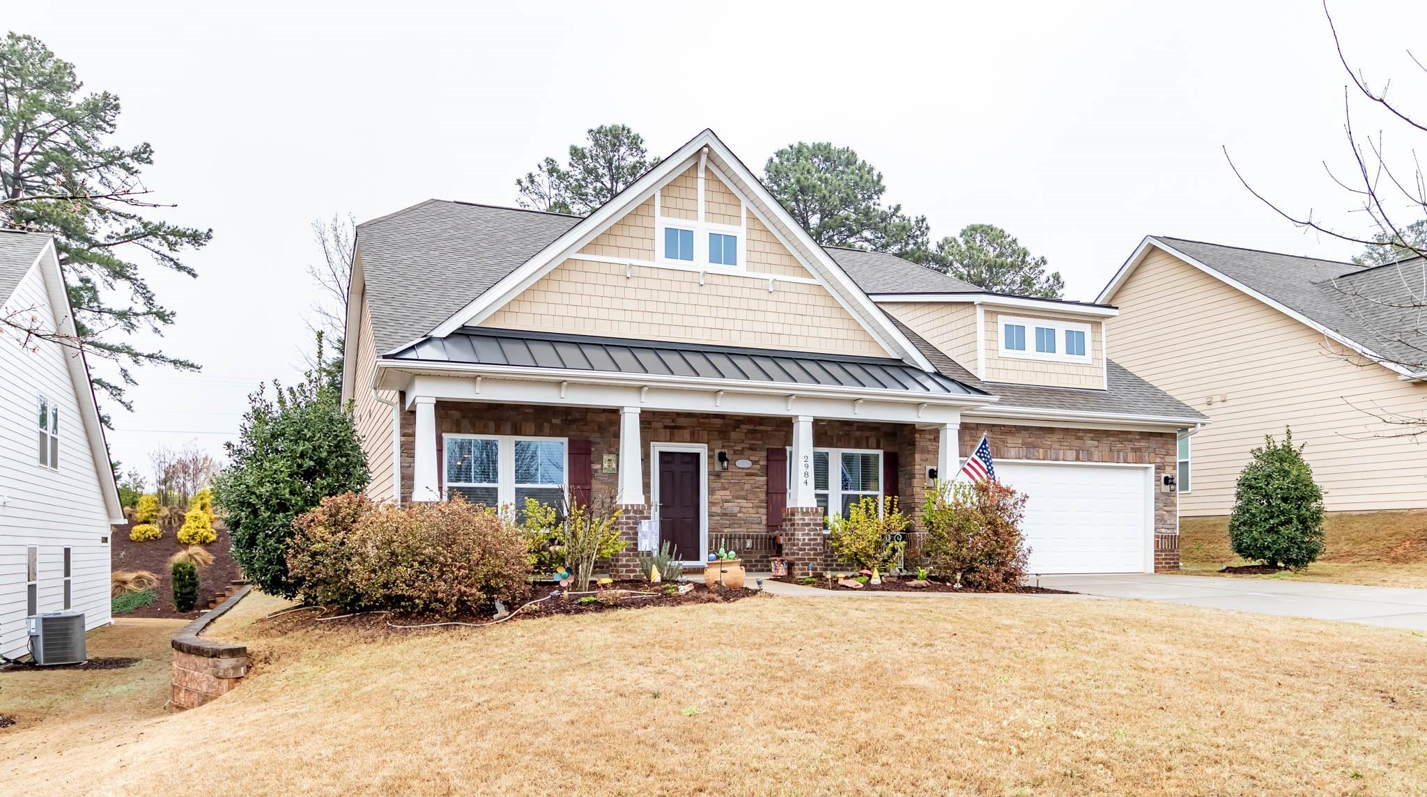 2984 Hiddenbrook Way Indian Land, SC 29707 - Photo 2 of 32 a view of a house with yard and plants
