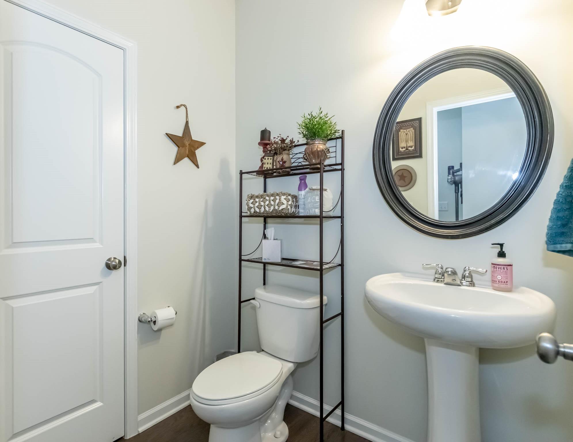 2984 Hiddenbrook Way Indian Land, SC 29707 - Photo 22 of 32 a bathroom with a sink mirror and toilet
