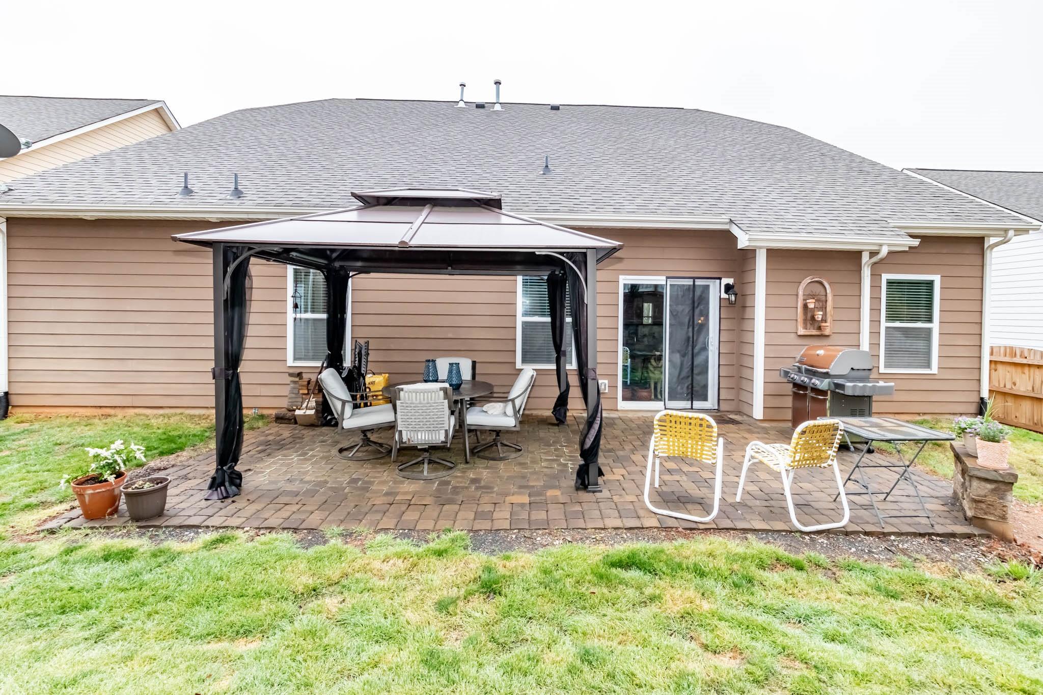 2984 Hiddenbrook Way Indian Land, SC 29707 - Photo 29 of 32 a house view with a sitting space and garden