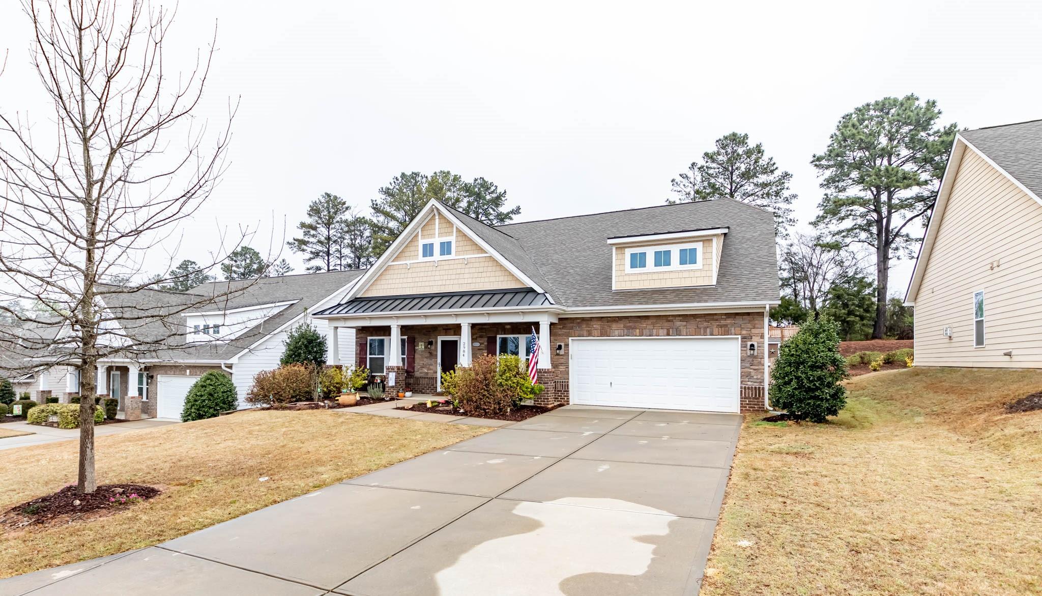 2984 Hiddenbrook Way Indian Land, SC 29707 - Photo 3 of 32 a front view of a building with street