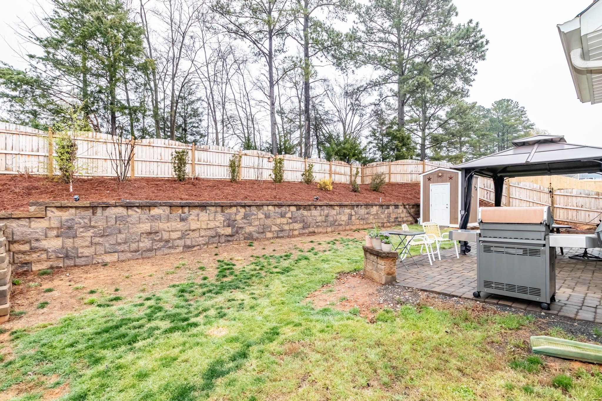 2984 Hiddenbrook Way Indian Land, SC 29707 - Photo 32 of 32 a view of a backyard with sitting area
