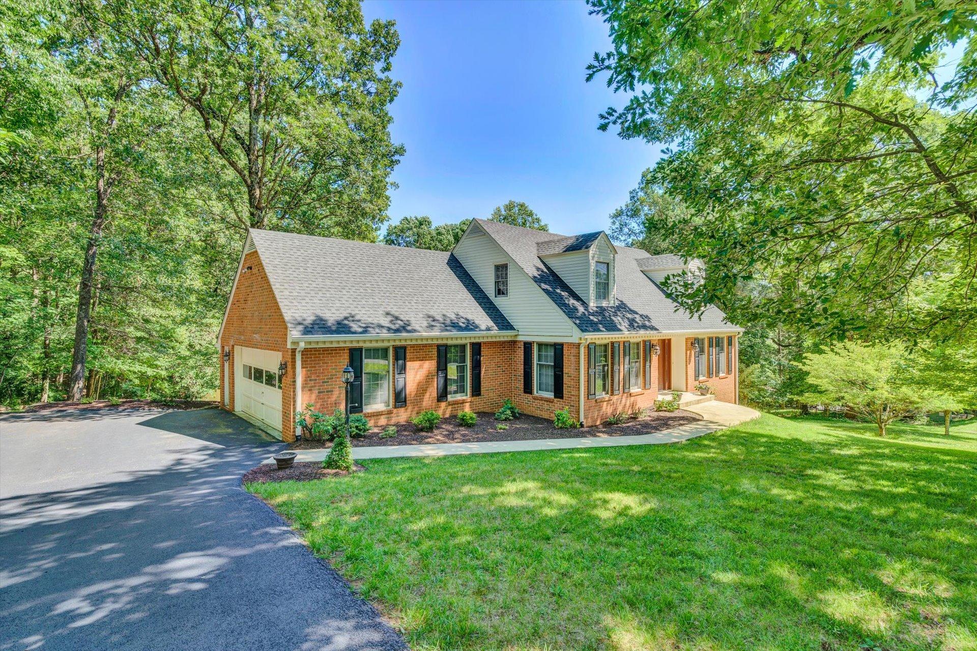 43 Nottingham Lane Blue Ridge, VA 24064 - Photo 1 of 51 an aerial view of a house with a big yard