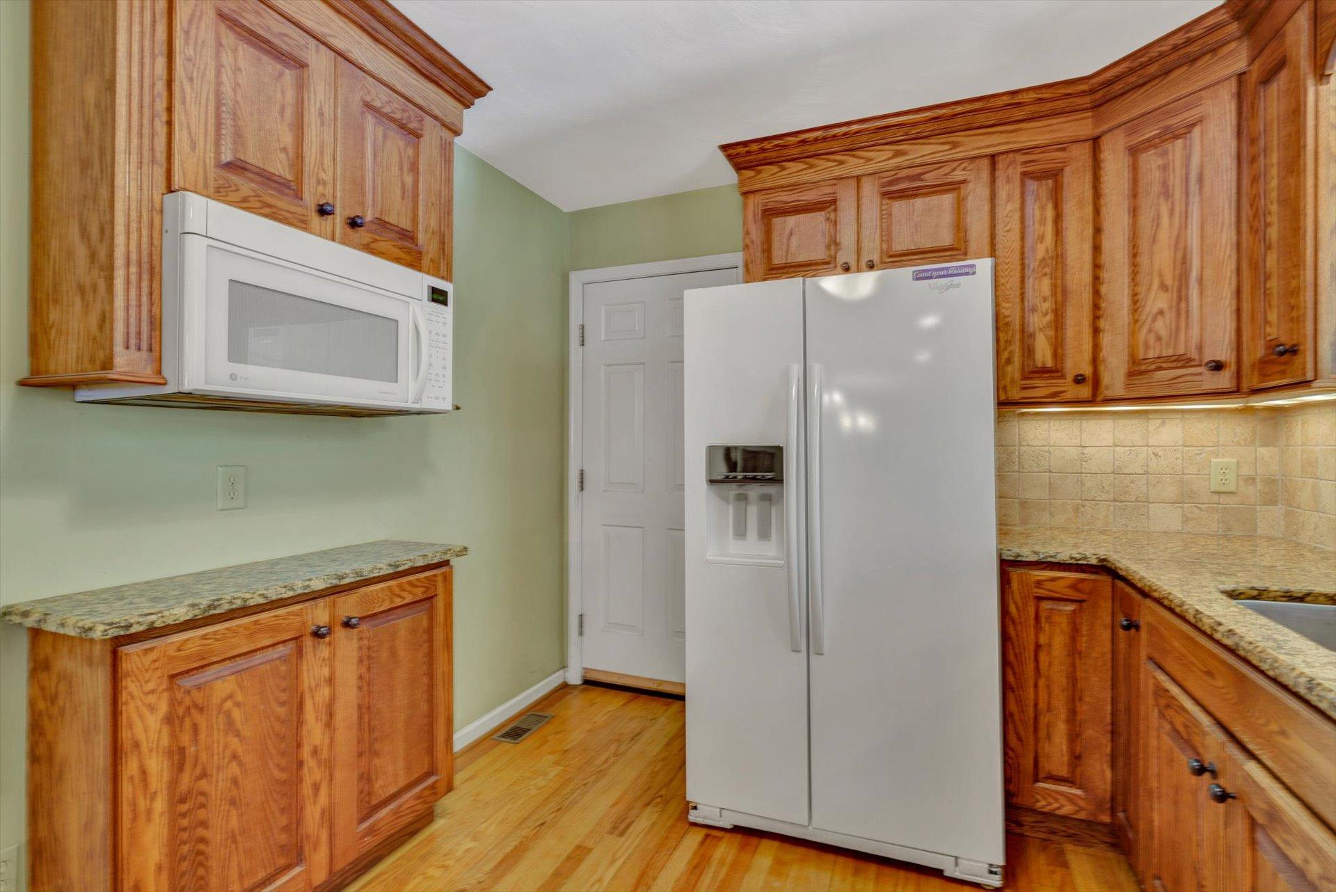 43 Nottingham Lane Blue Ridge, VA 24064 - Photo 18 of 51 a kitchen with stainless steel appliances granite countertop a refrigerator and a sink