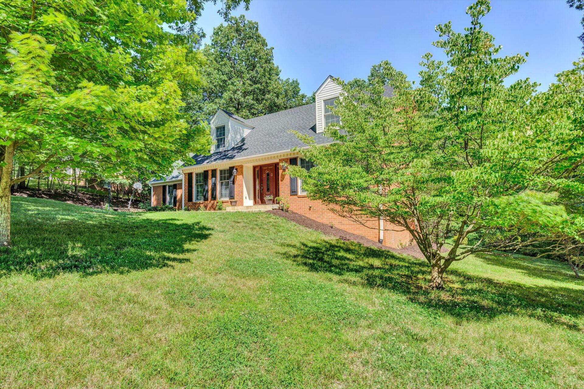43 Nottingham Lane Blue Ridge, VA 24064 - Photo 3 of 51 a front view of a house with a yard