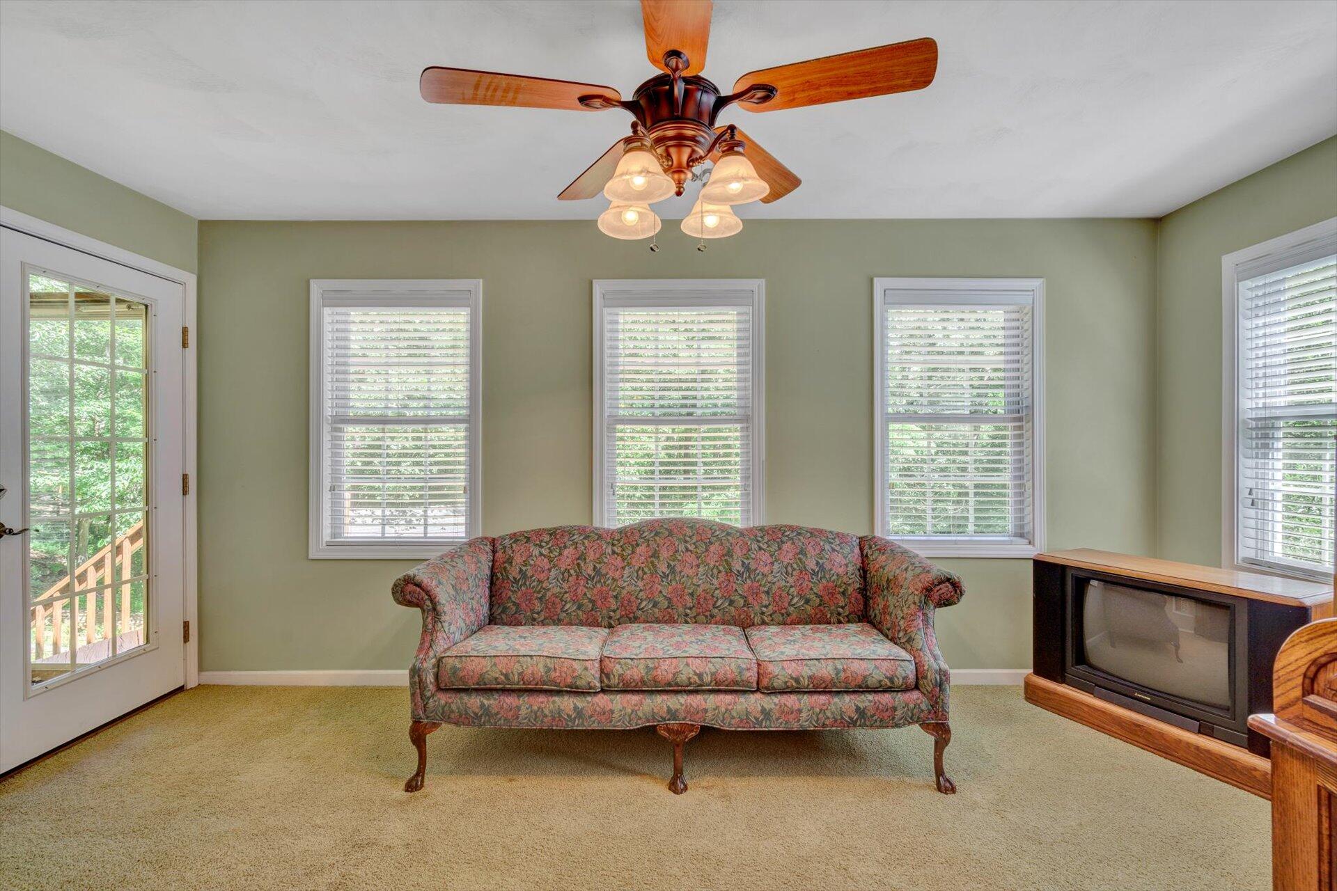 43 Nottingham Lane Blue Ridge, VA 24064 - Photo 21 of 51 a living room with furniture and a large window