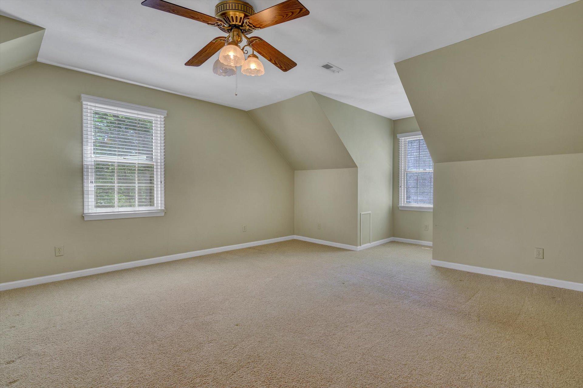 43 Nottingham Lane Blue Ridge, VA 24064 - Photo 34 of 51 an empty room with windows and fan