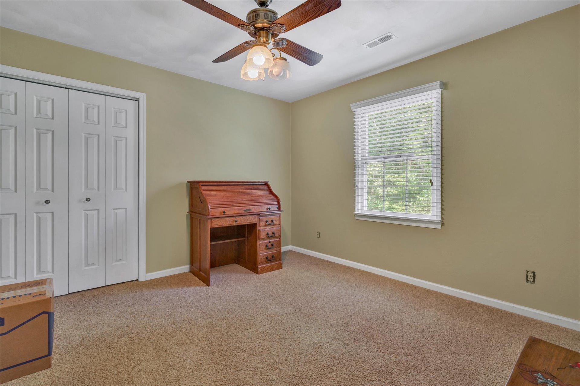 43 Nottingham Lane Blue Ridge, VA 24064 - Photo 39 of 51 an empty room with windows and fan