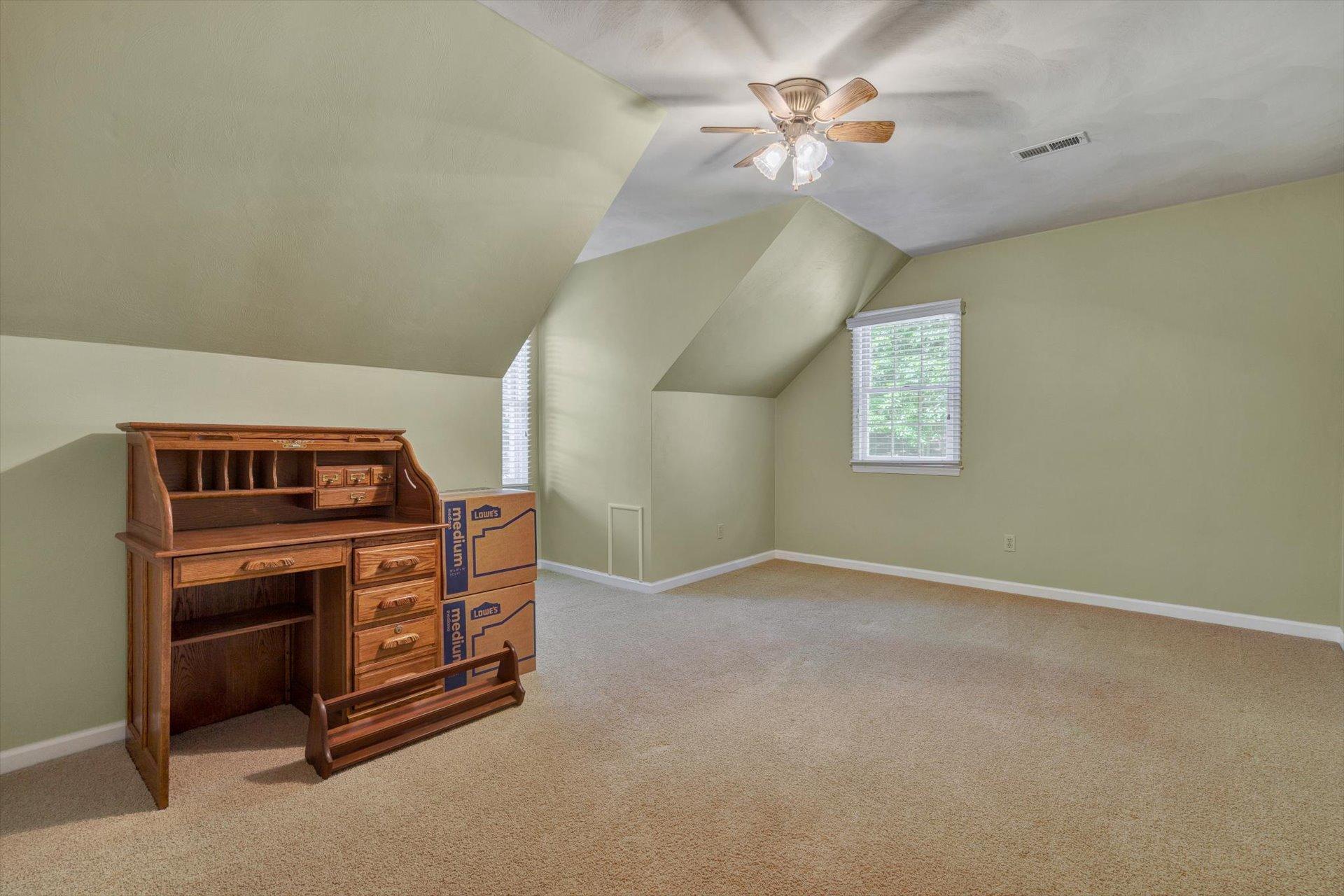 43 Nottingham Lane Blue Ridge, VA 24064 - Photo 40 of 51 a view of an empty room with a chandelier fan