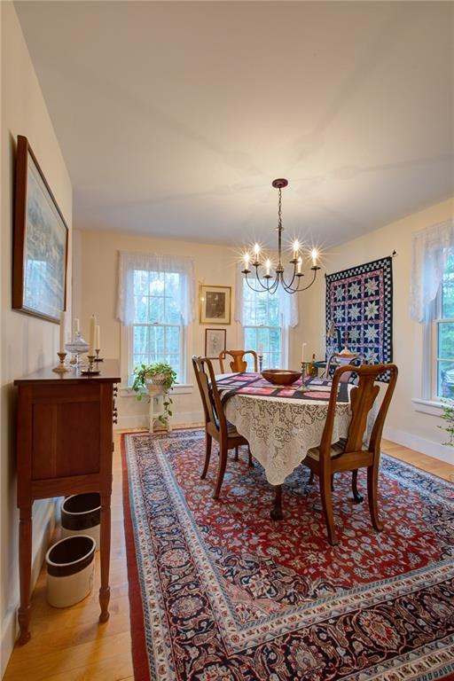 64 Walpole Meeting House Road Walpole, ME 04573 - Photo 7 of 35 Access to kitchen on one end and...