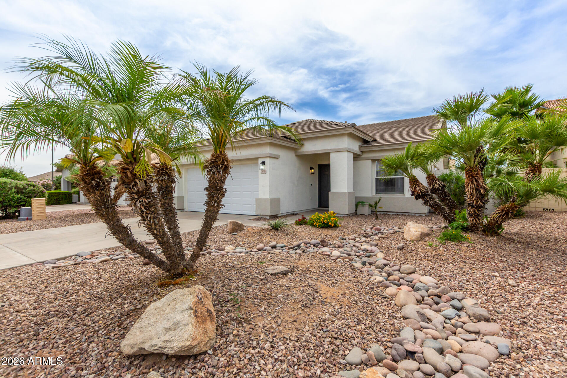 3674 South Joshua Tree Lane Gilbert, AZ 85297 - Photo 30 of 30 a view of a house with a tub and chair