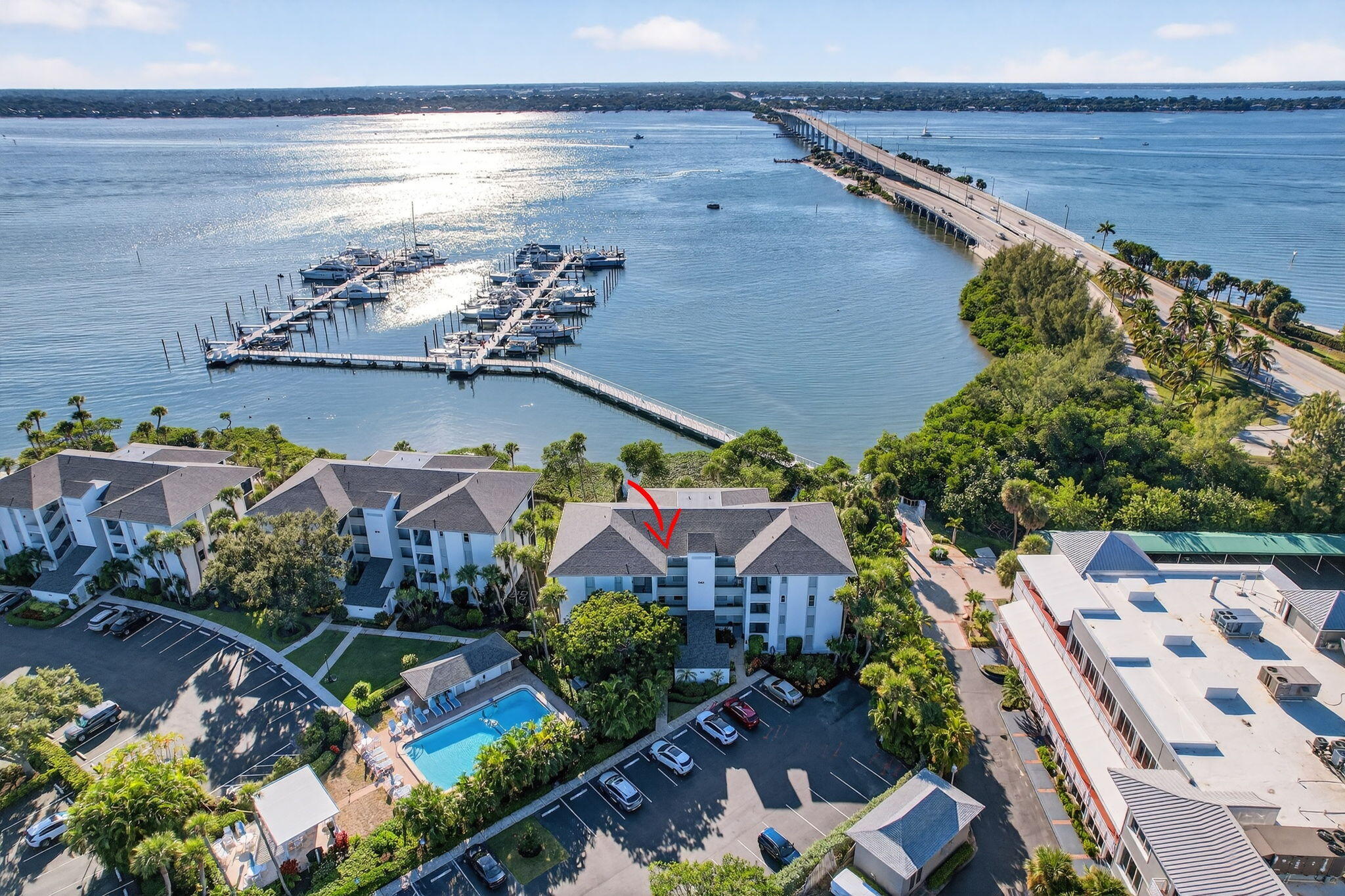 390 Northeast Edgewater Drive, Unit 403 Stuart, FL 34996 - Photo 28 of 46 an aerial view of multiple house