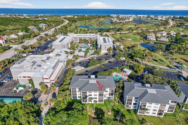 an aerial view of residential building with outdoor space