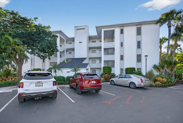 a cars parked in front of a building