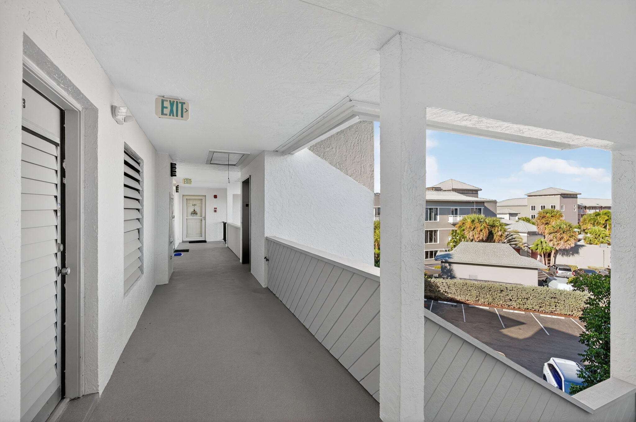 390 Northeast Edgewater Drive, Unit 403 Stuart, FL 34996 - Photo 46 of 46 a view of hallway with furniture