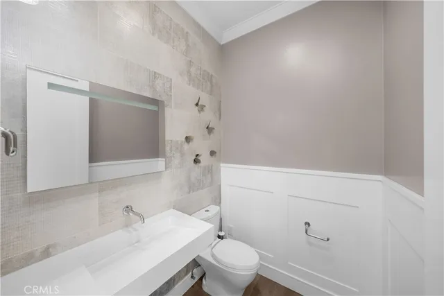 a bathroom with a sink and a toilet