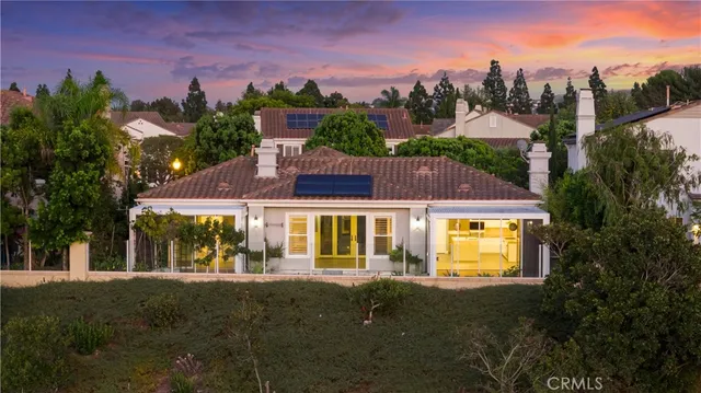 a view of a house with a swimming pool