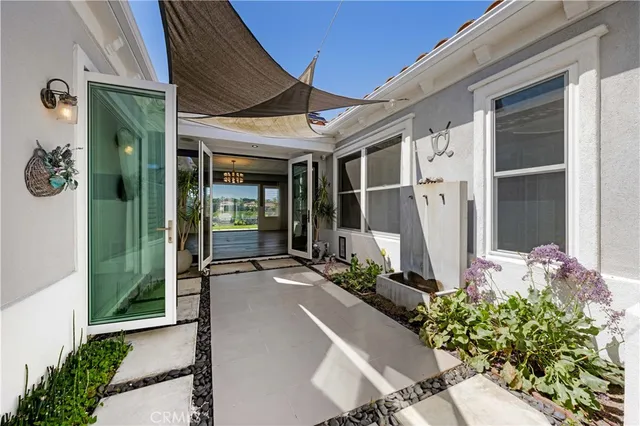 a front view of a house with a porch