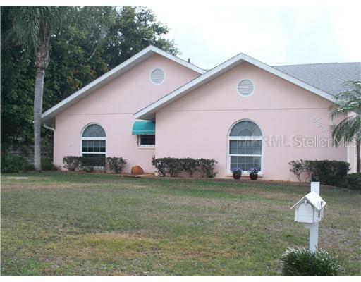 580 Argus Road Venice, FL 34293 - Photo 1 of 1 Exterior Front - Entry to the house is on the side