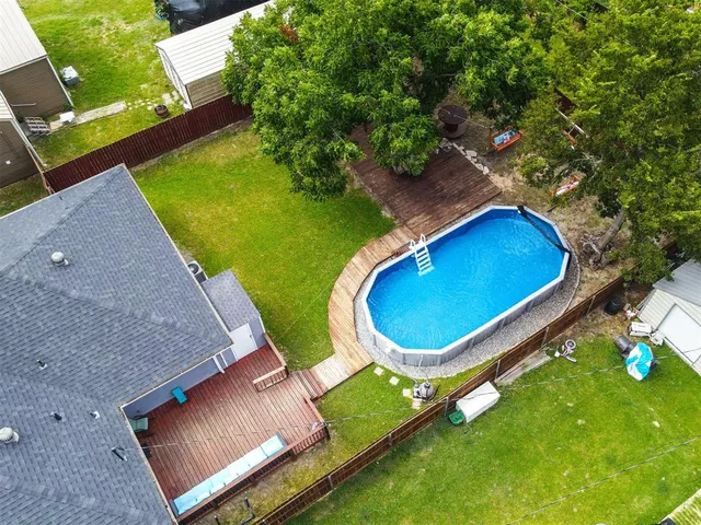 an aerial view of a backyard