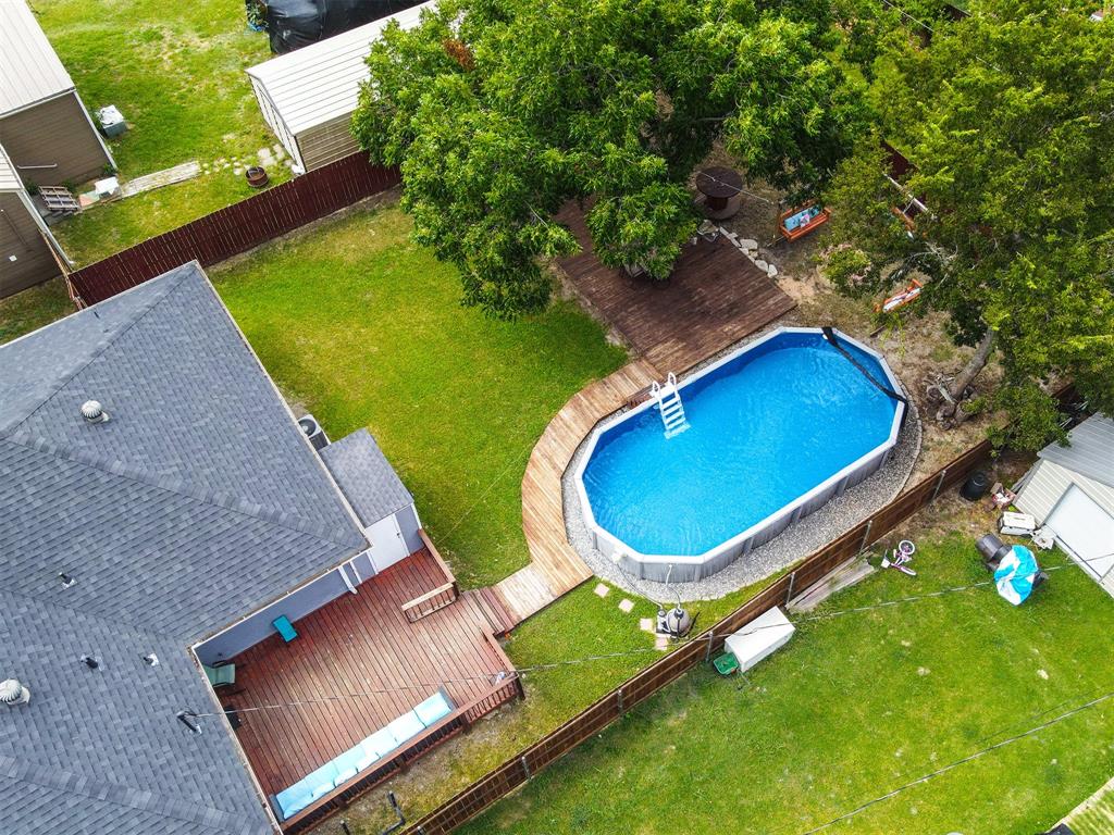 106 South 4th Street Celeste, TX 75423 - Photo 5 of 28 an aerial view of a backyard