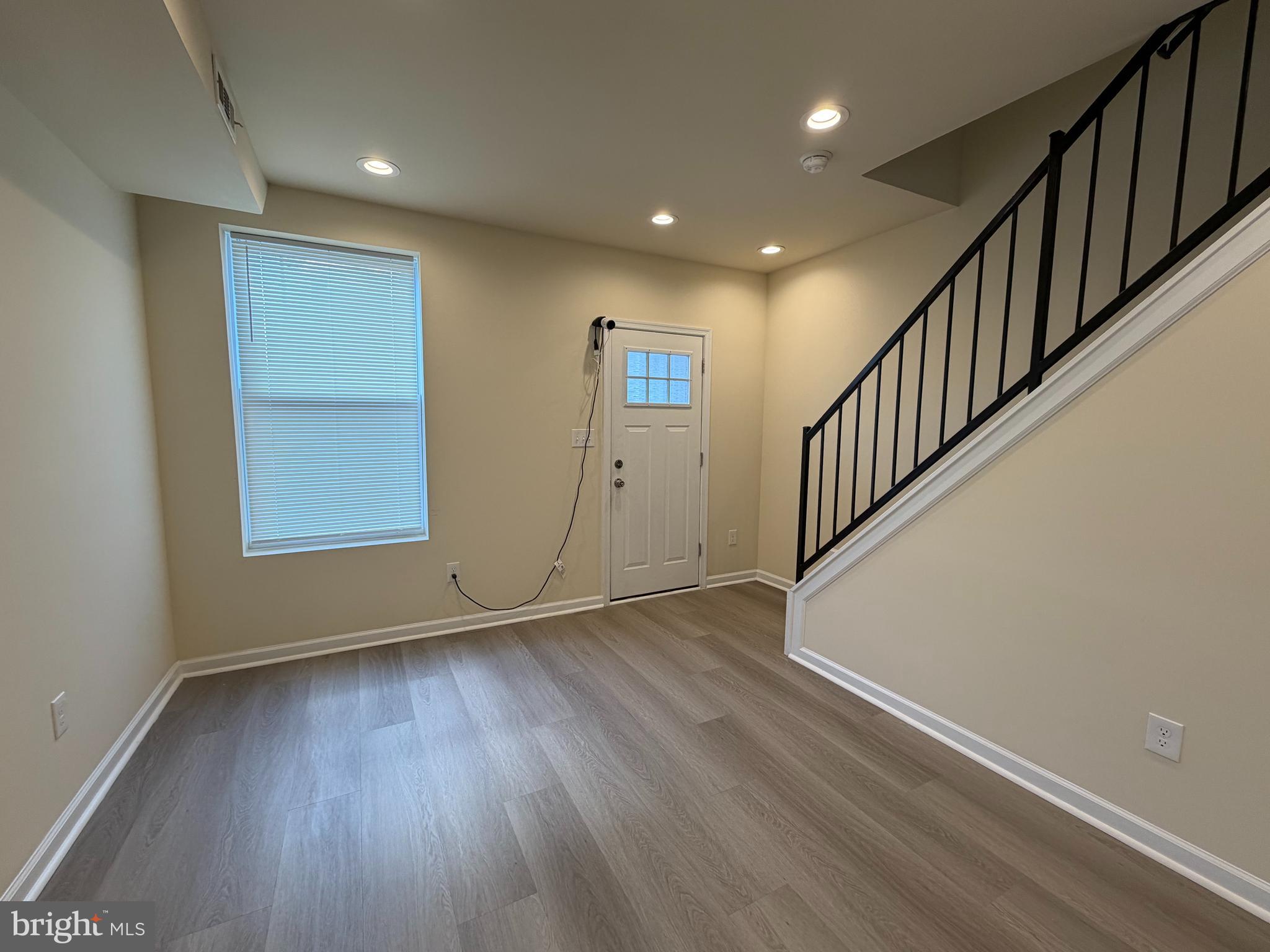 601 North Clinton Street Baltimore, MD 21205 - Photo 4 of 12 a view of an entryway with wooden floor