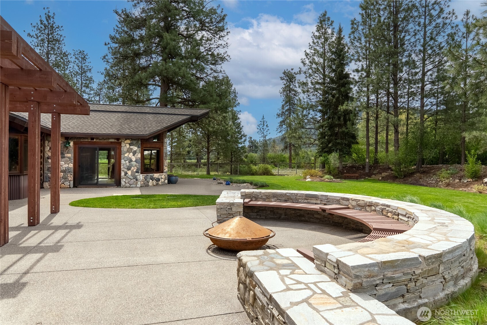 179 Wolf Creek Road Winthrop, WA 98862 - Photo 24 of 40 a view of swimming pool with a patio