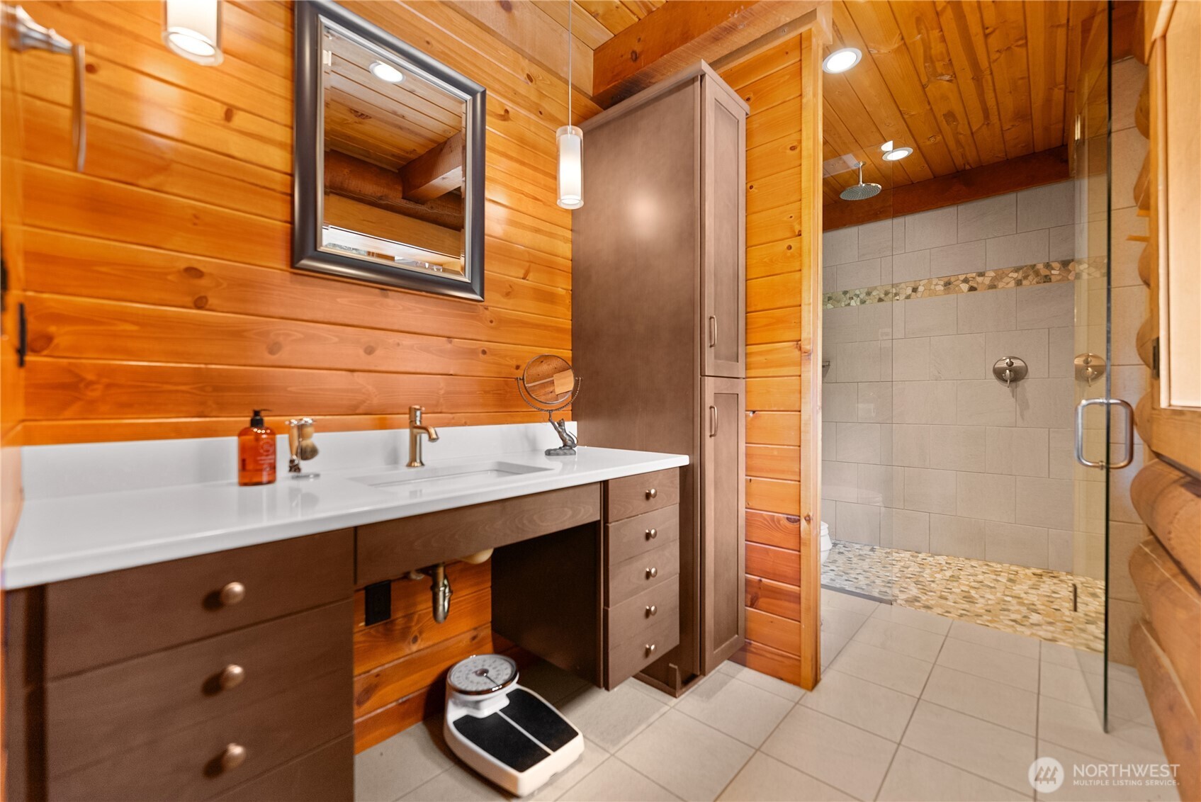 179 Wolf Creek Road Winthrop, WA 98862 - Photo 33 of 40 a bathroom with a sink and a mirror