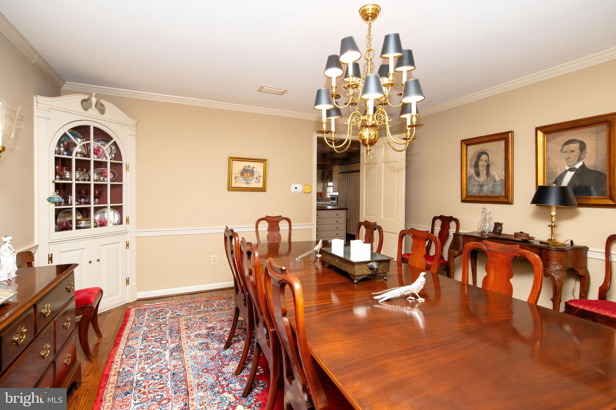 1616 Hampton Road Abington, PA 19001 - Photo 18 of 53 a dining room with wooden floor and chandelier