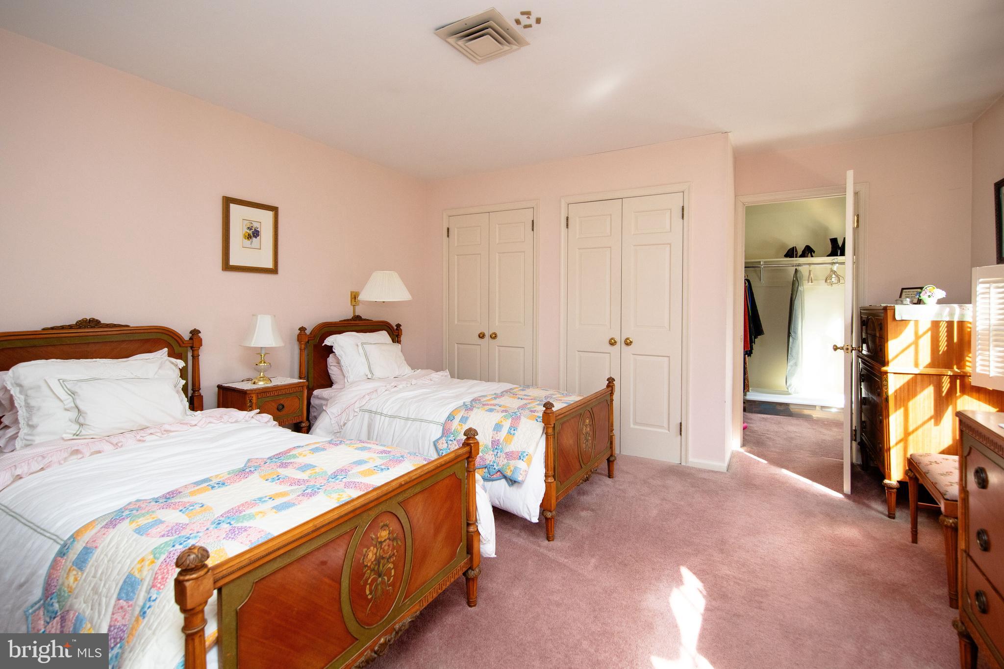 1616 Hampton Road Abington, PA 19001 - Photo 36 of 53 a bedroom with two beds and a walk in closet