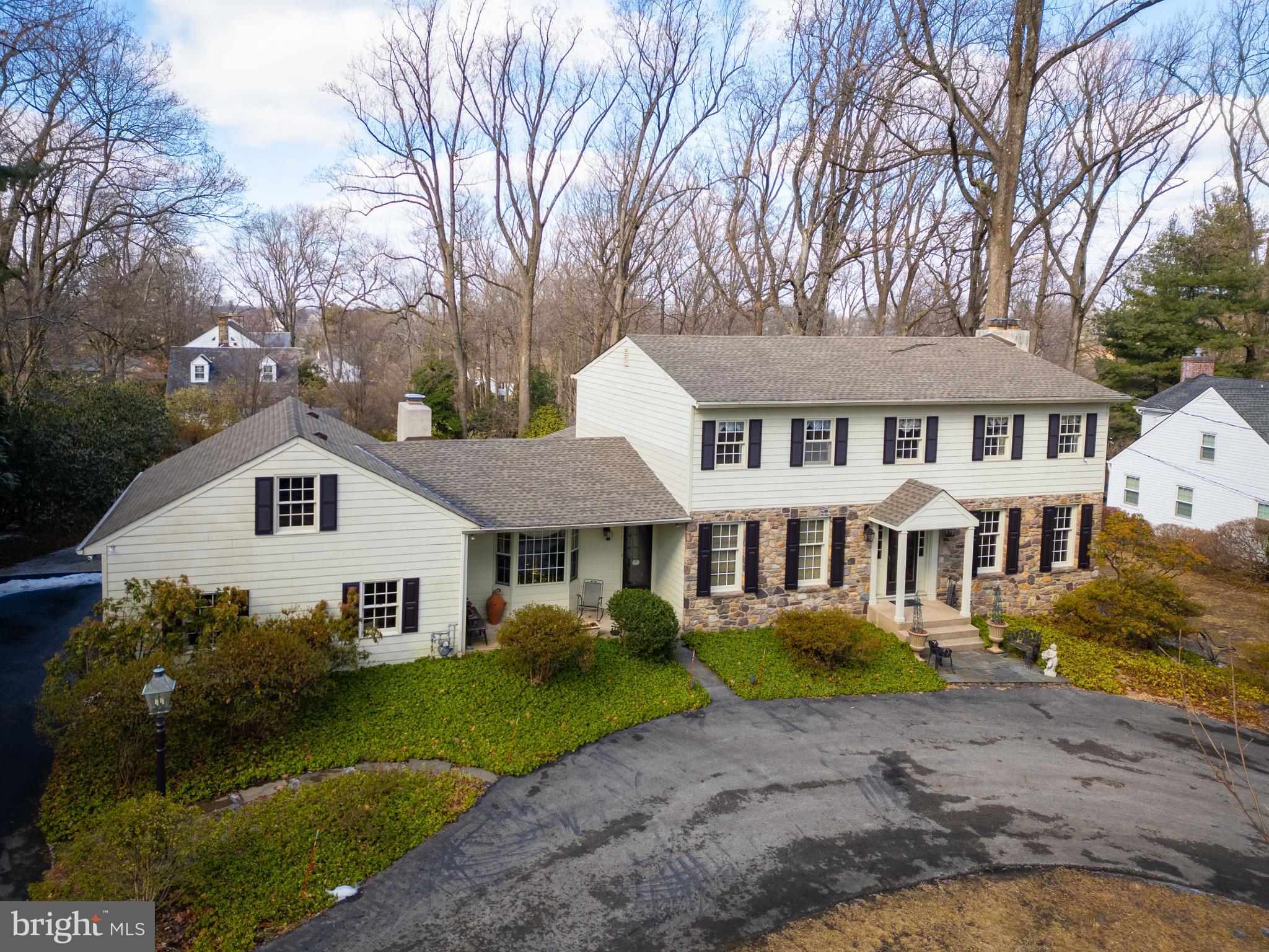 1616 Hampton Road Abington, PA 19001 - Photo 5 of 53 a front view of a house with a garden and trees